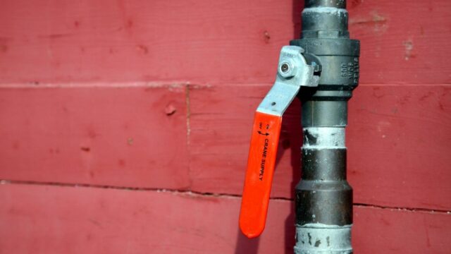 Ball valve main water shutoff with red lever handle