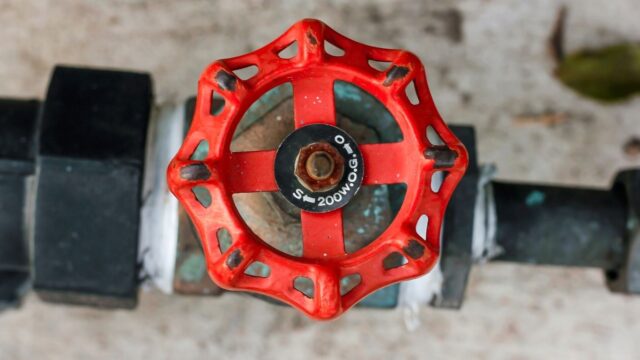 Gate valve main water shutoff with round red handle